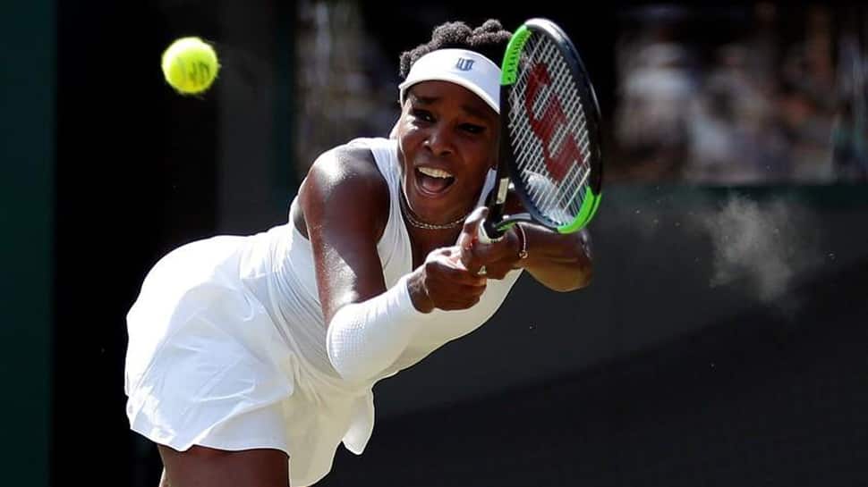 Venus Williams overcomes illness to advance to 2nd round at Indian Wells