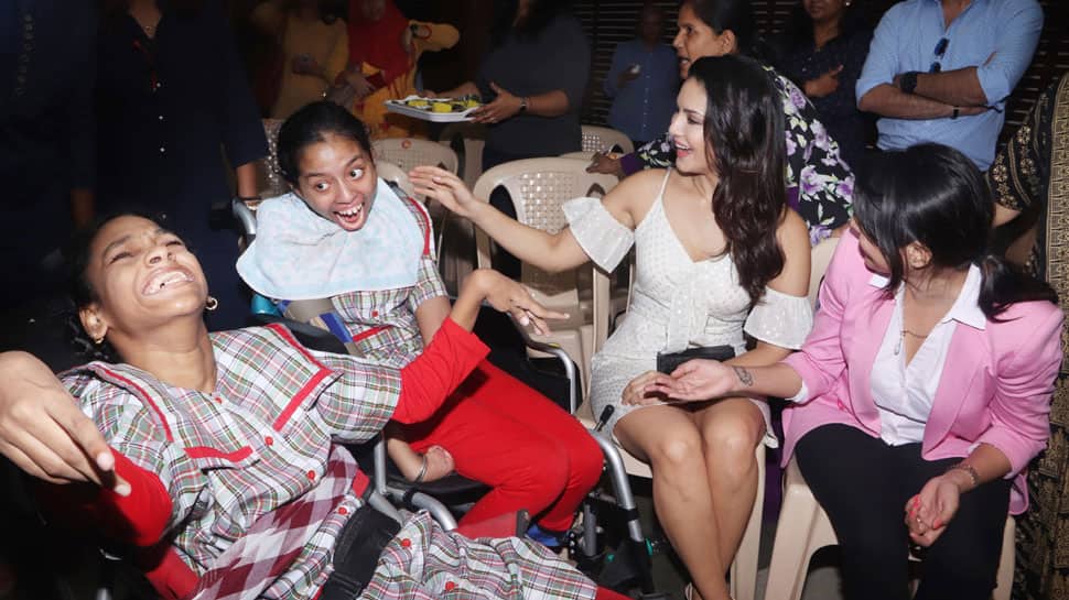 Sunny Leone meets special kids, creates awareness about aqua therapy—See pics
