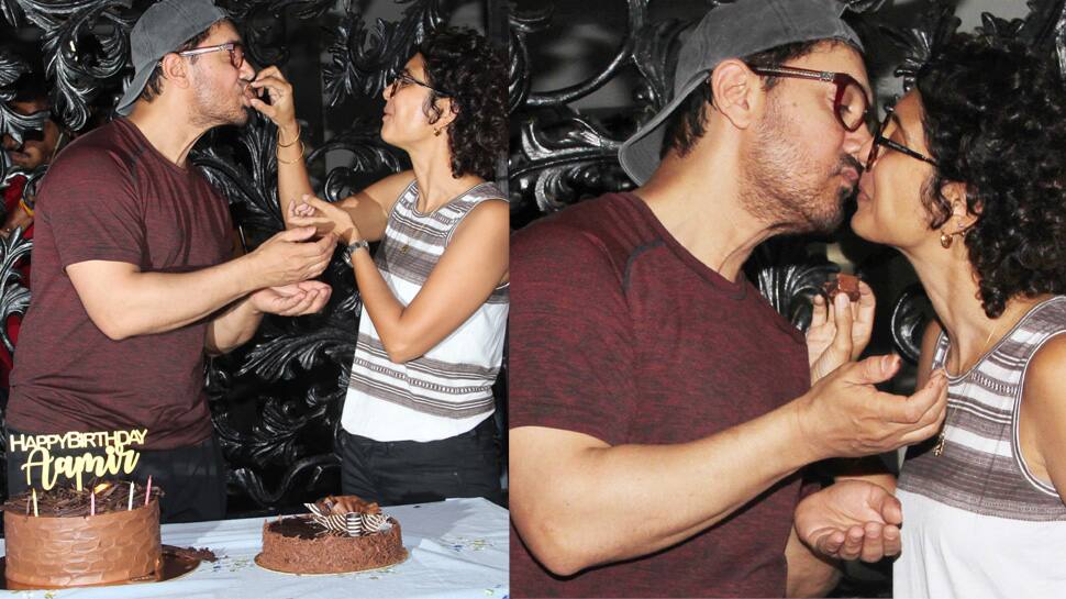 Aamir Khan and wife Kiran Rao seal birthday celebrations with a kiss!