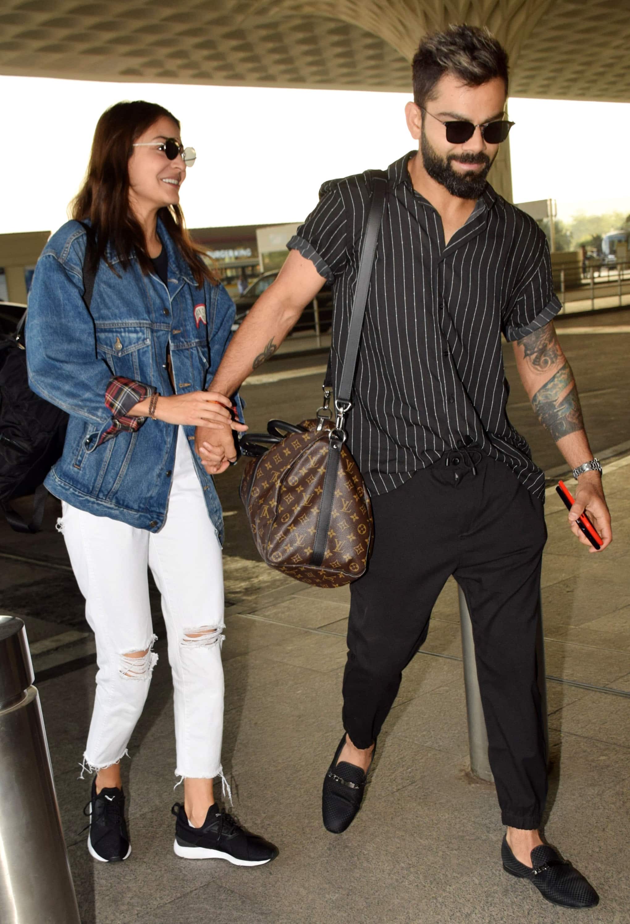 Anushka Sharma and Virat Kohli in Puma x Ami are all love and chic; Check  out the cost of her waist bag