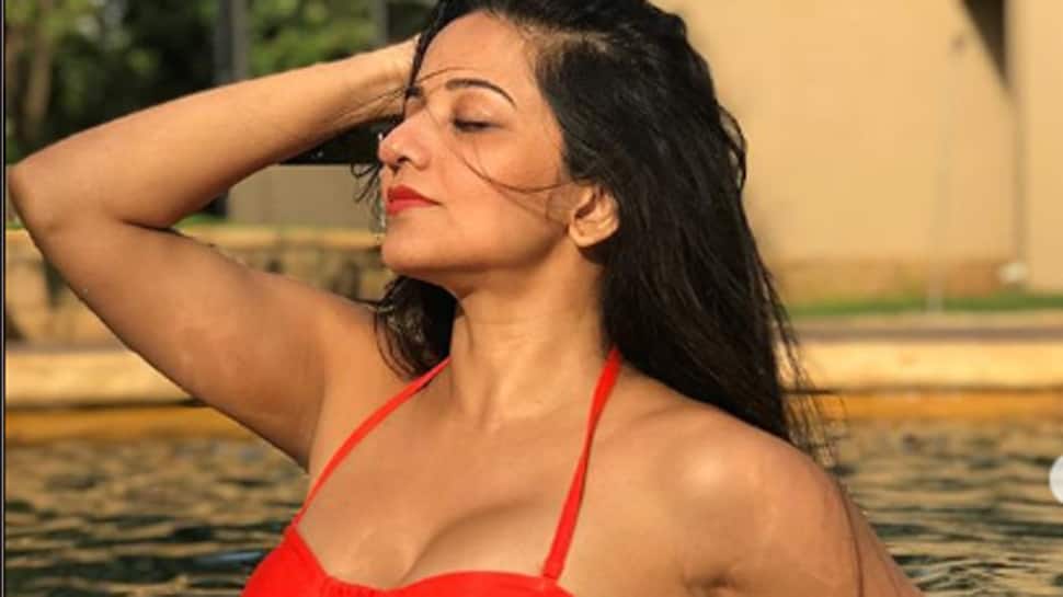 Monalisa raises the temperature in a red swimwear—See pic