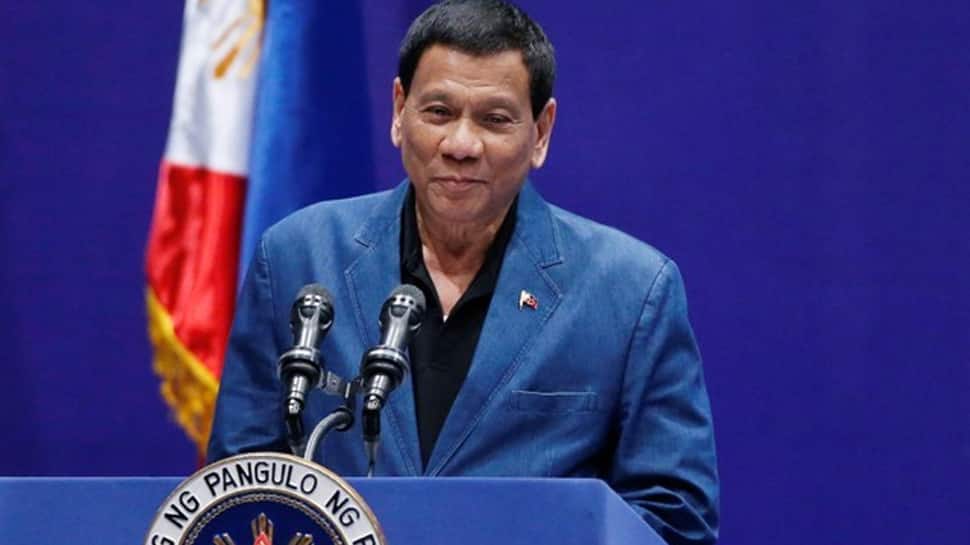 Philippines' Duterte tells China to 'lay off' island in disputed waters Philippines' Duterte tells China to 'lay off' island in disputed waters