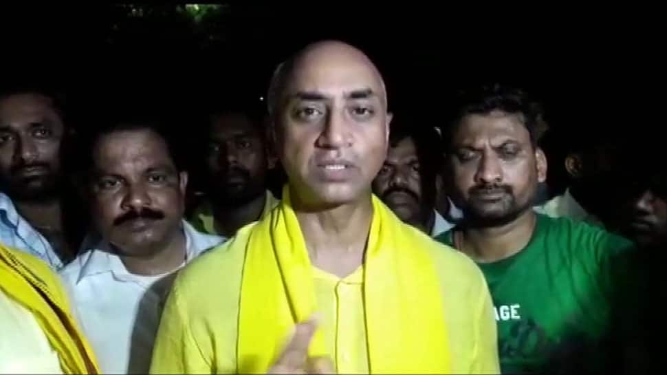 Guntur MP Galla Jayadev, TDP leaders stage dharna over IT raids; call it &#039;vendetta politics&#039;