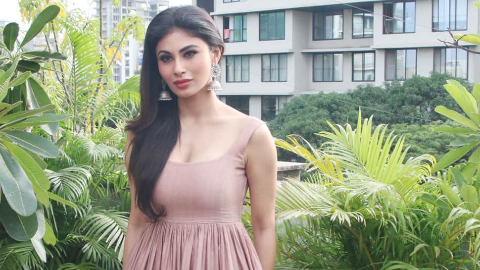 Mouni Roy shows her love for green, oozes oomph in a tube dress—See pics
