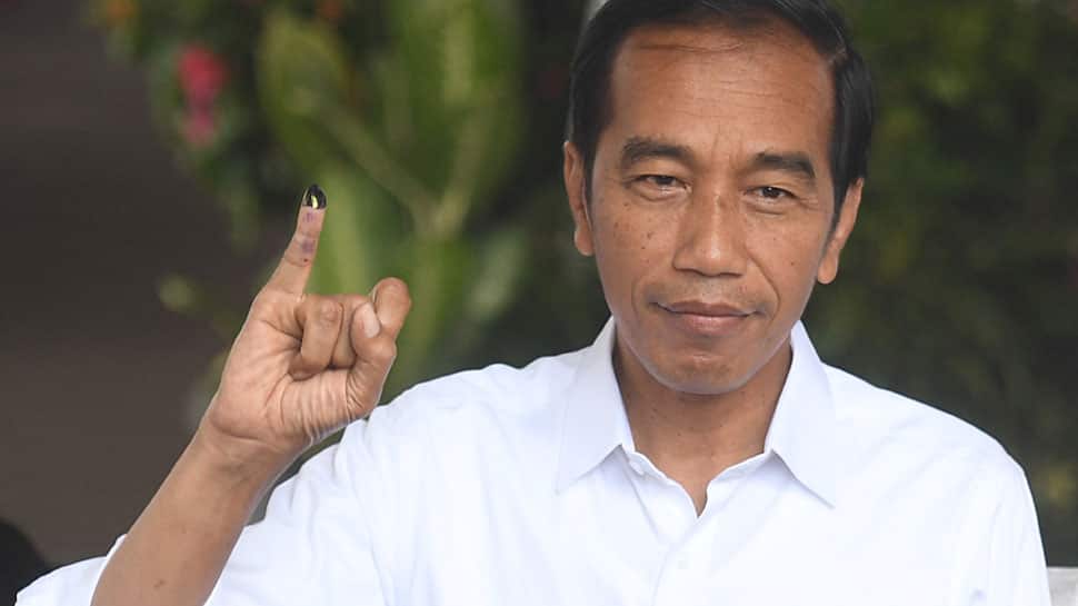Indonesian ruling coalition leads in unofficial count of parliamentary vote: Pollster