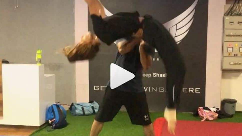 This video of Disha Patani learning to do a back handspring will give you major fitness goals-Watch