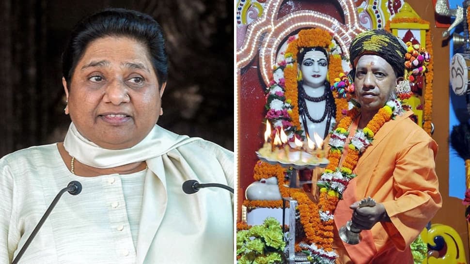 Adityanath&#039;s temple visits violated EC order, claims Mayawati; CM&#039;s advisor denies allegation