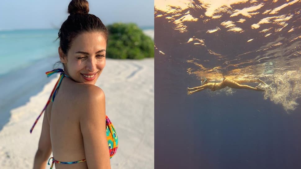 Malaika Arora turns water baby, raises the mercury in a red bikini—Pics