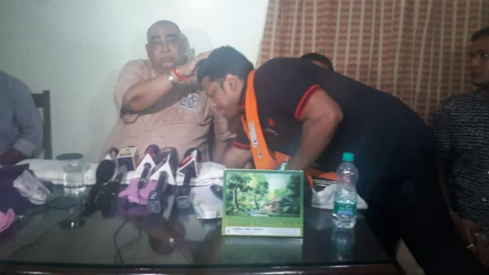 BJP&#039;s Anupam Hazra touches TMC leader Anubrata Mondal&#039;s feet, party seeks explanation