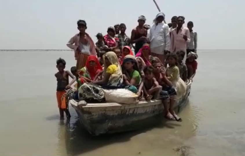 In pics: Voters in Uttar Pradesh&#039;s Sitapur cross rivers to reach polling booths