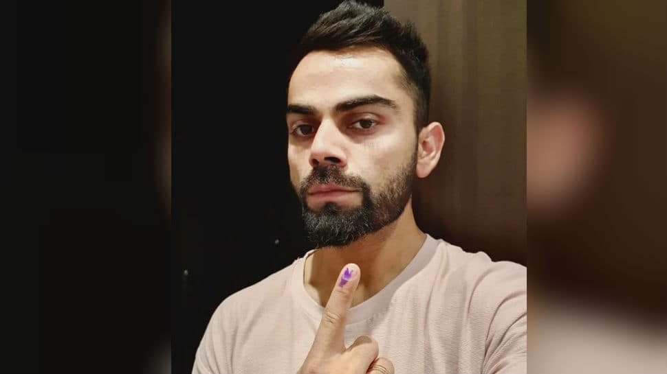 Virat Kohli casts his vote, urges others to exercise their &#039;right&#039;