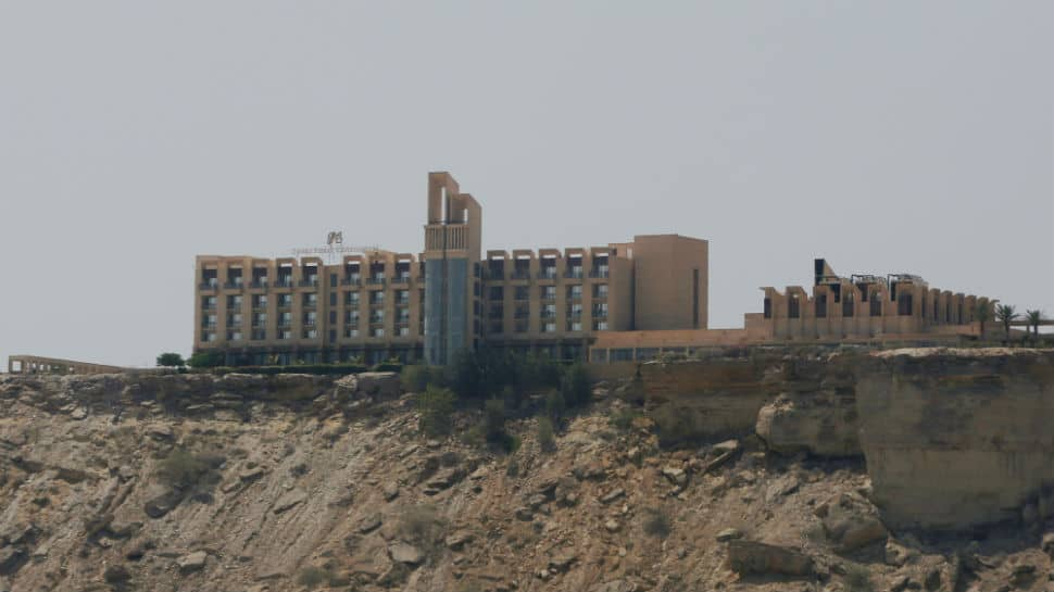 Pakistani forces comb luxury hotel a day after raid killed at least five