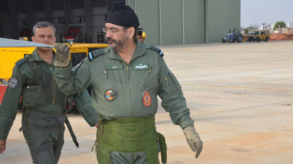 IAF Chief Birender Singh Dhanoa visits Sulur air base, inspects Tejas, flies &#039;formidable war machine&#039; MiG-21