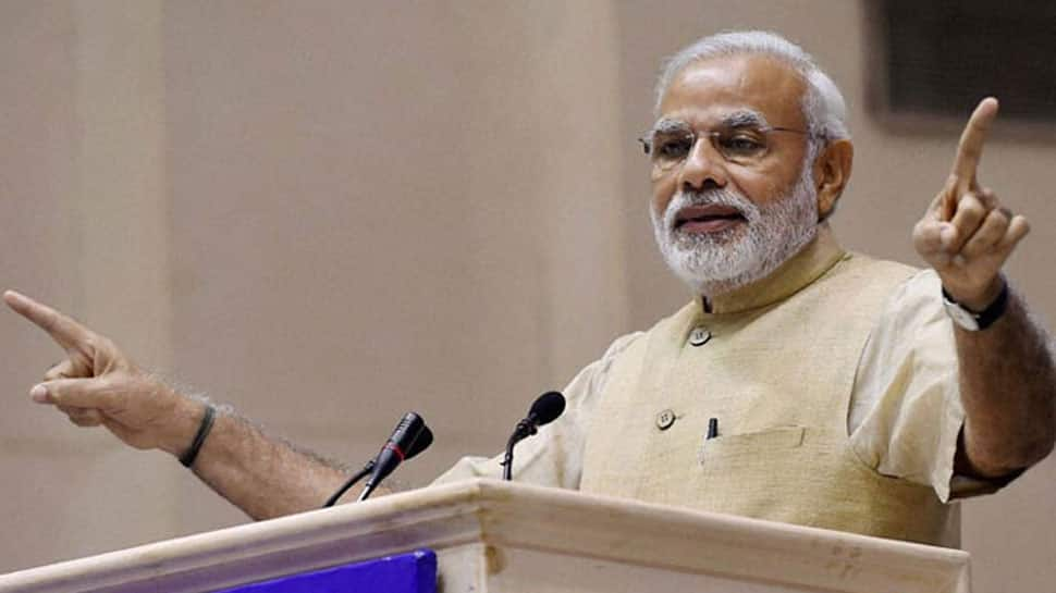 Narendra Modi meets officials and staff of PMO after landslide win in Lok Sabha polls