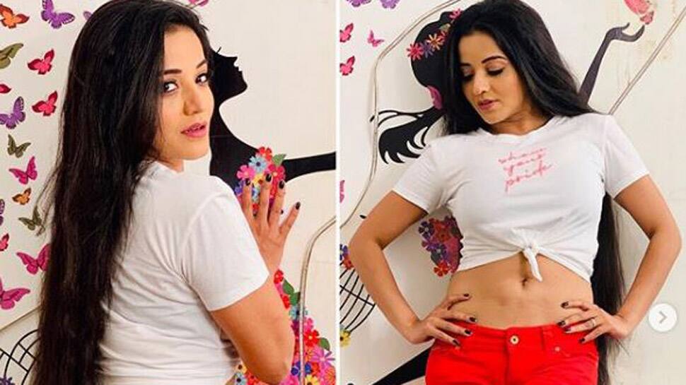 Monalisa dazzles in red hot pants and white t-shirt-See pic
