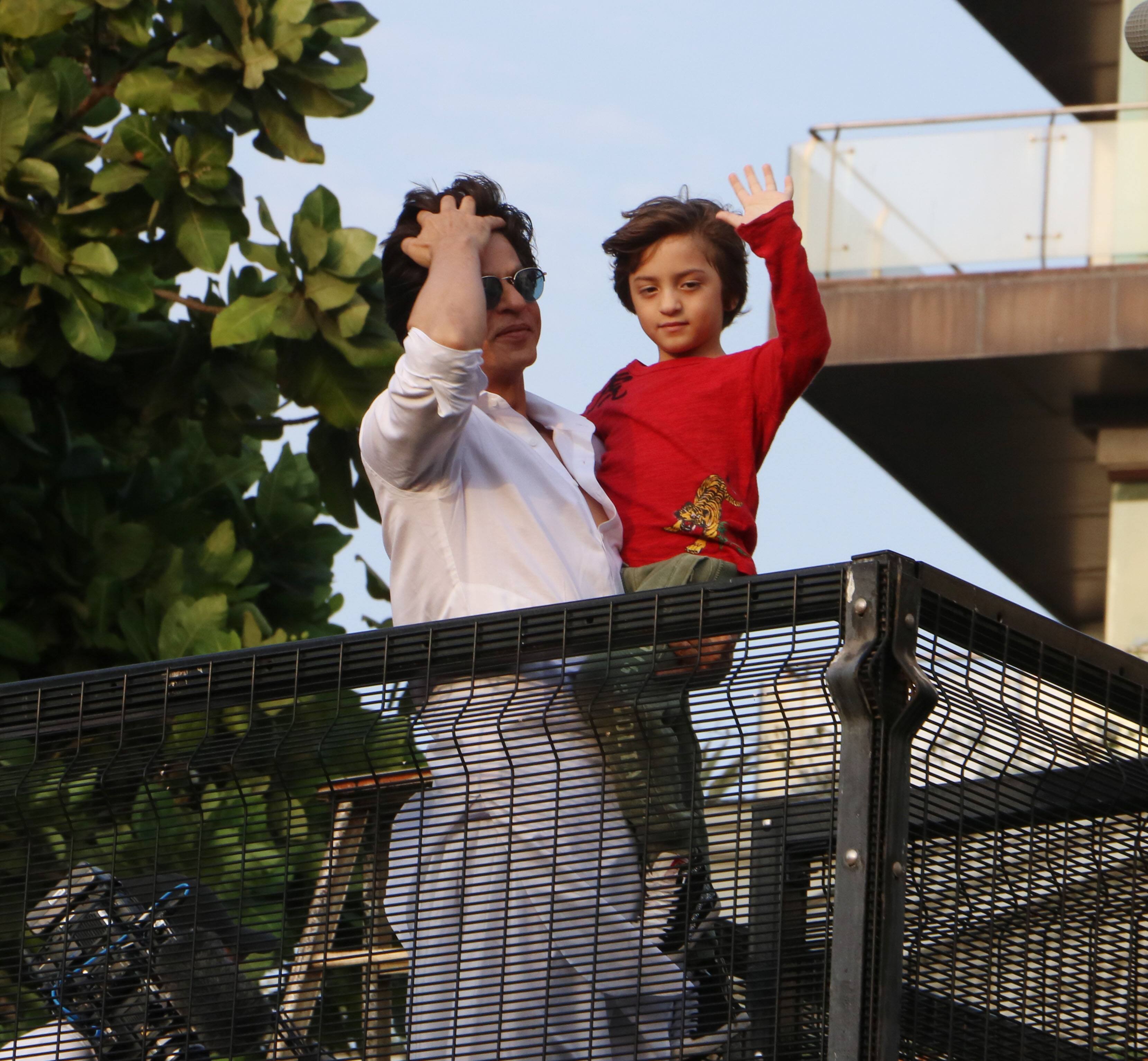 Shah Rukh Khan, son AbRam greet crowd Eid