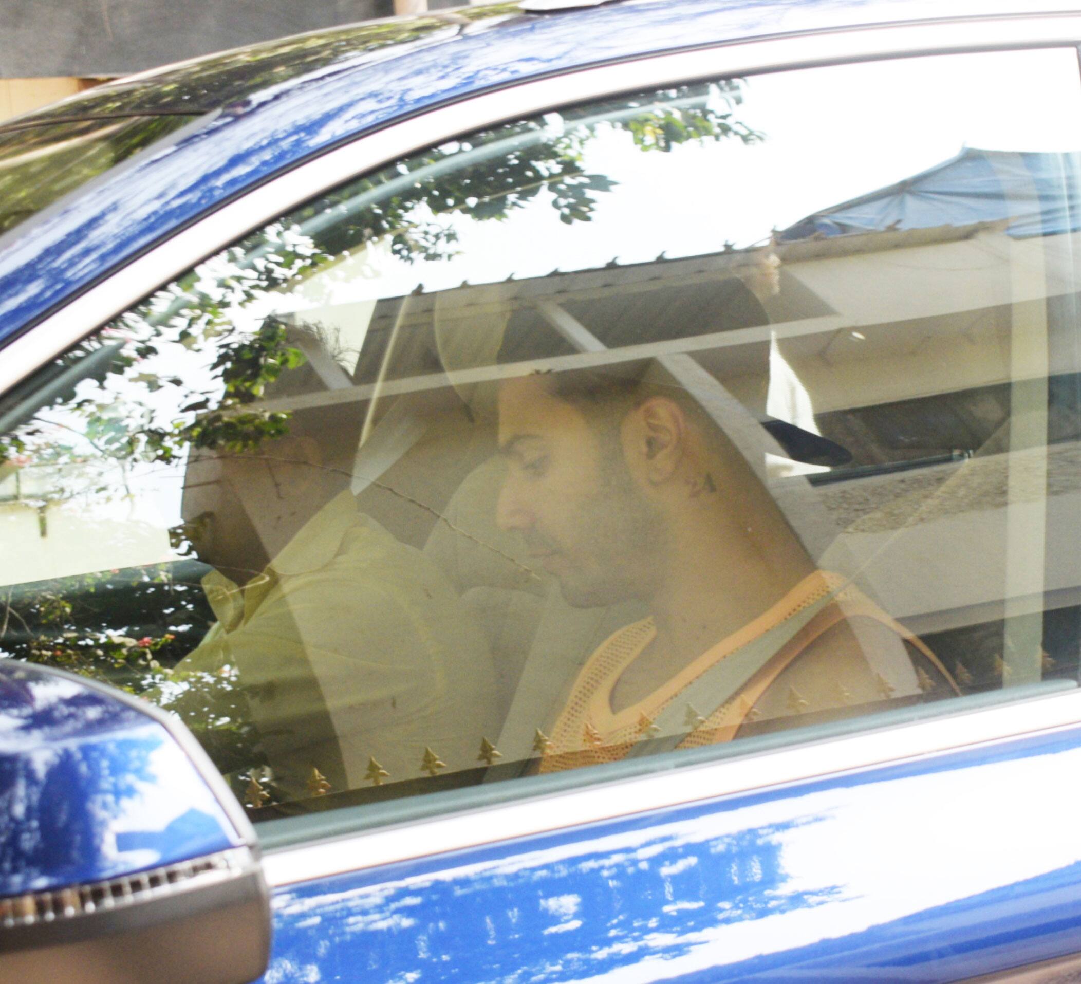 Varun Dhawan inside the car