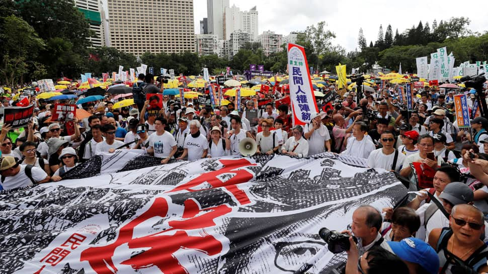 Tens of thousands gather in Hong Kong for rally against China extradition bill