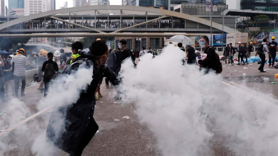Hong Kong shuts offices for the week after worst-ever violence over extradition bill