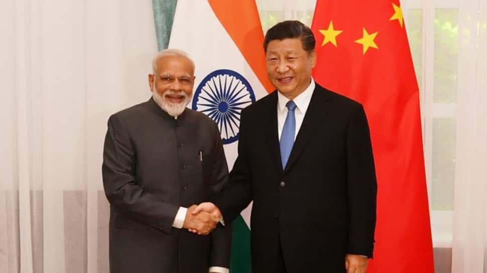 PM Modi meets China&#039;s Xi Jinping; discusses Pakistan, Masood Azhar and Bank of China