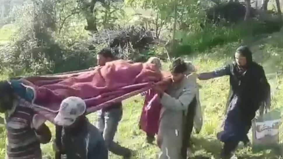 Jammu and Kashmir: Villagers carry patient on shoulders due to lack of road connectivity in Kupwara district