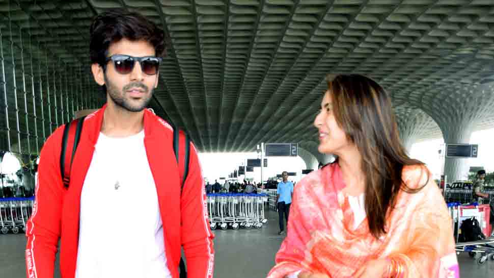 Sara Ali Khan, Kartik Aaryan share a laugh as they get snapped at airport together — Pics