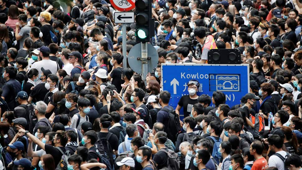 Hong Kong protesters disperse after blockading police headquarters