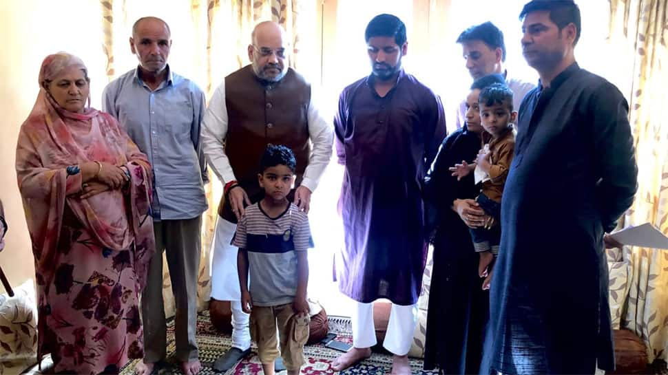 Amit Shah first HM to visit Jammu and Kashmir Police martyr&#039;s home, offers job to wife