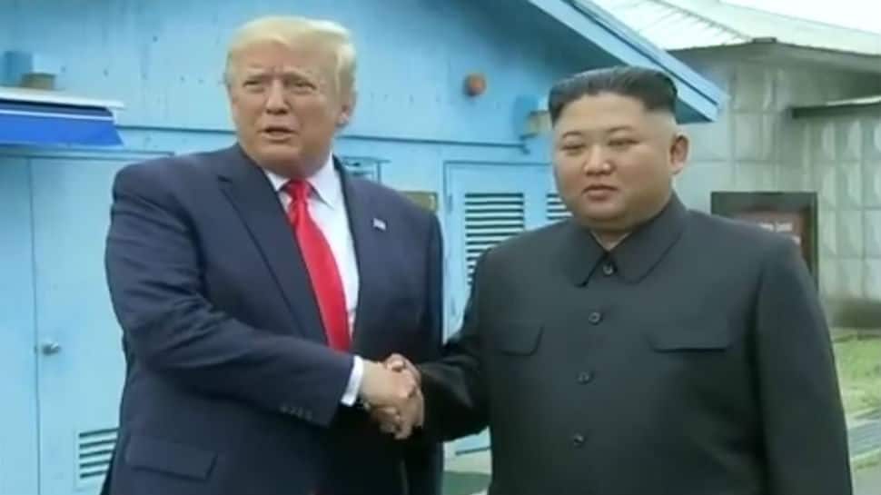 In historic first, Donald Trump meets Kim Jong-un and steps into North Korea