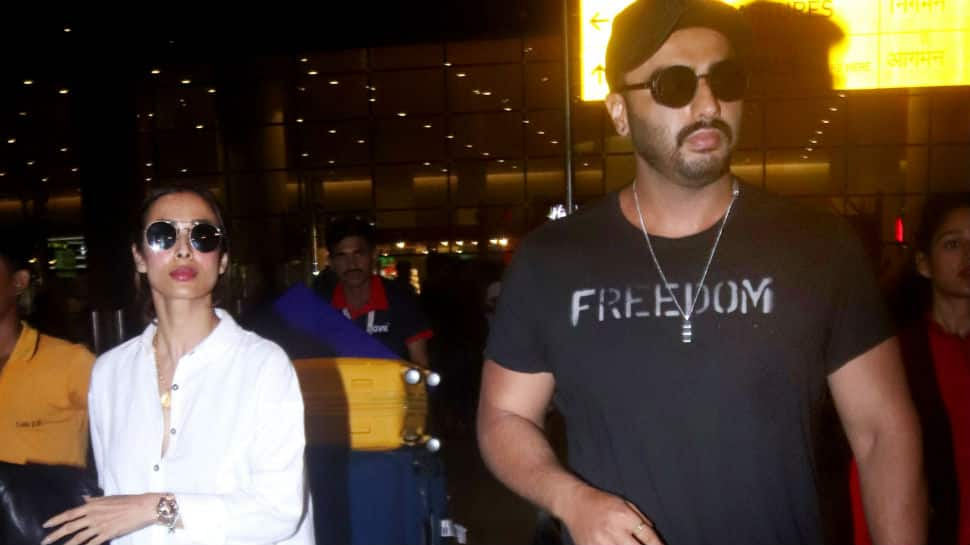 Vacation over, Arjun Kapoor and Malaika Arora touchdown in Mumbai - Pics