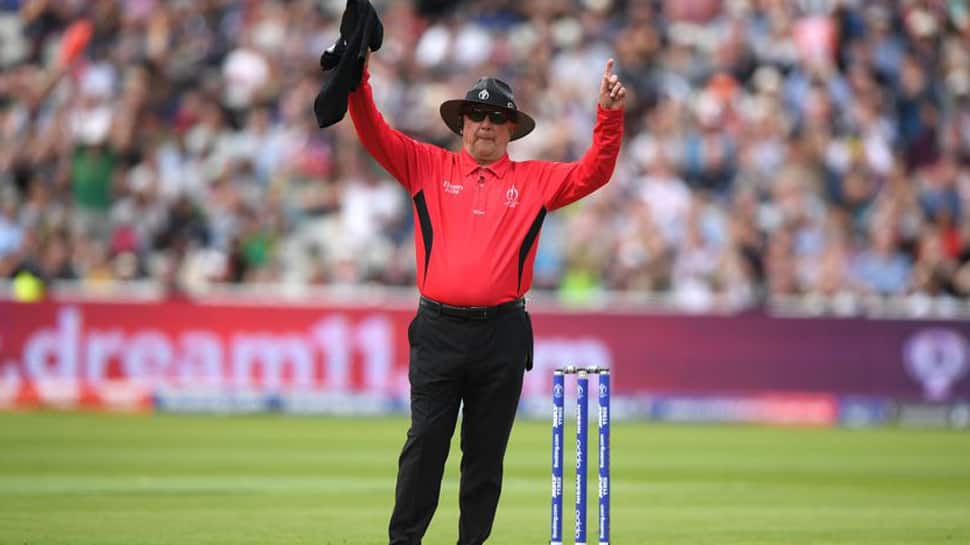 Umpire Gould prepares to raise his finger for the final time at Headingley