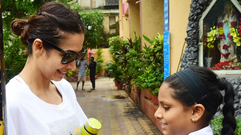 Young fans of Malaika Arora elated to get her autograph outside yoga studio—See Pics