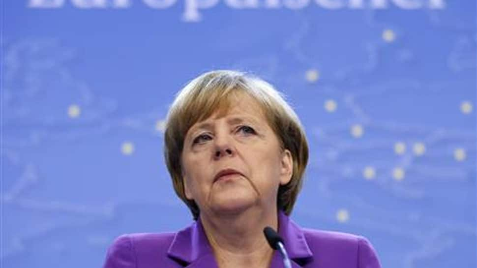 Merkel has third bout of shaking, says she is fine and &#039;working through&#039; issue