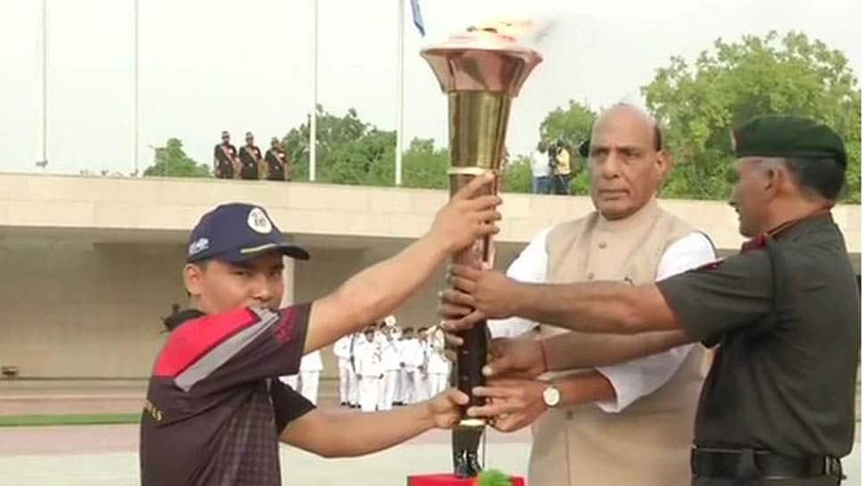 Defence Minister Rajnath Singh lights ‘Victory Flame’ from National War Memorial