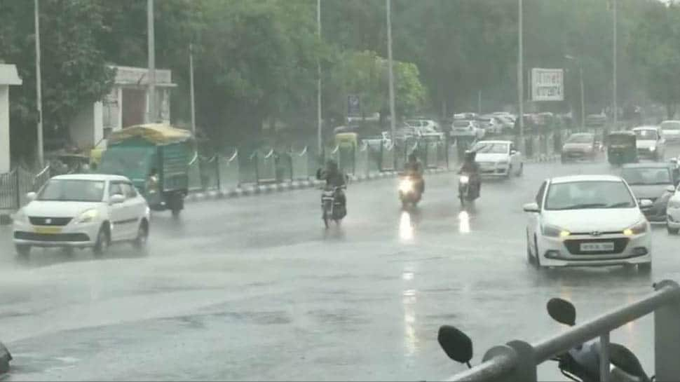 Heavy rain lashes Delhi and adjoining areas, brings relief from scorching heat