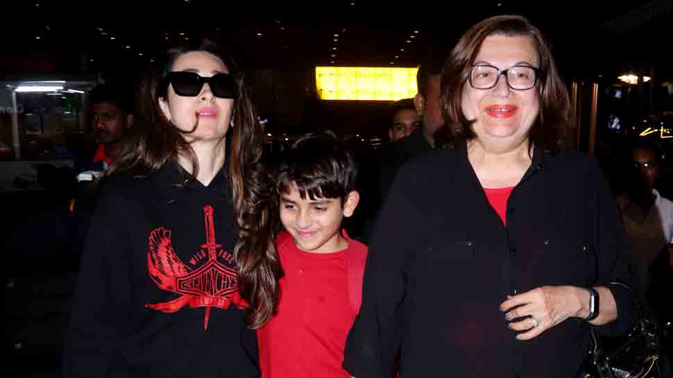 Karisma Kapoor flies back from London with children, twins with mother Babita in black — Pics inside