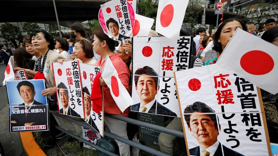 Shinzo Abe secures majority in Japan election