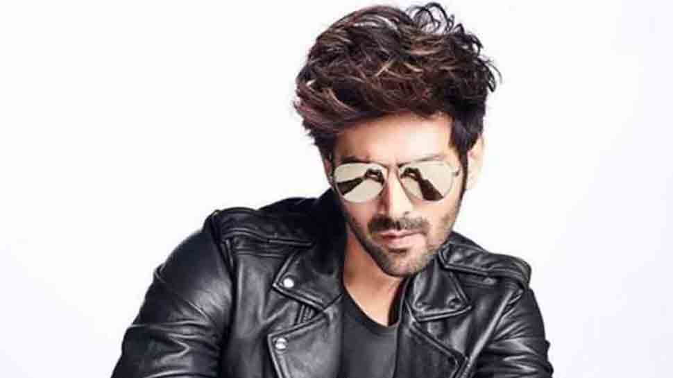 Photo Gallery Kiara Advani, Ram Charan giggle as they get papped