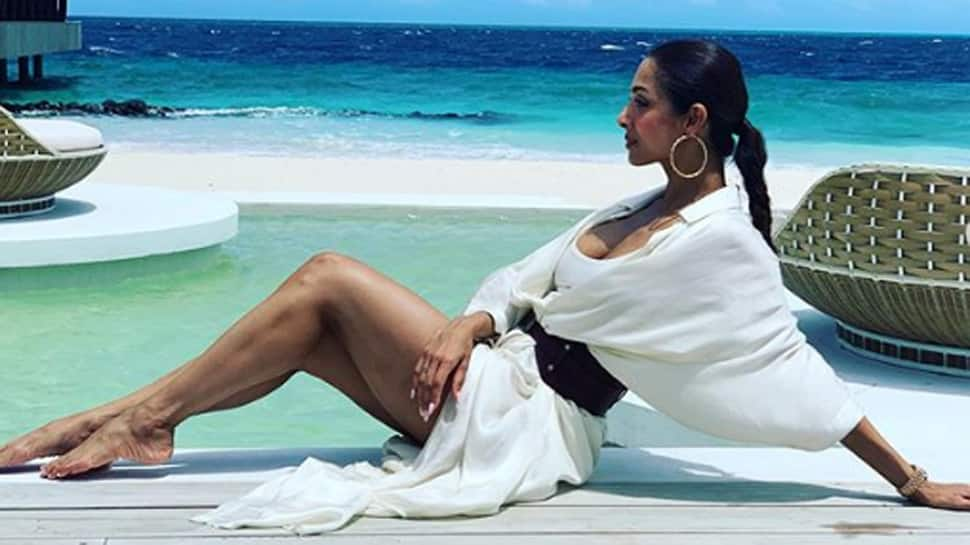 Malaika Arora oozes oomph as a beach babe on Travel+Leisure magazine cover—See photos