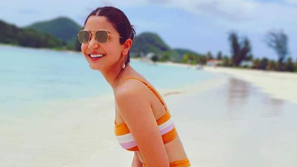 Anushka Sharma&#039;s latest pic in bikini sets internet on fire, hubby Virat Kohli has the best reaction