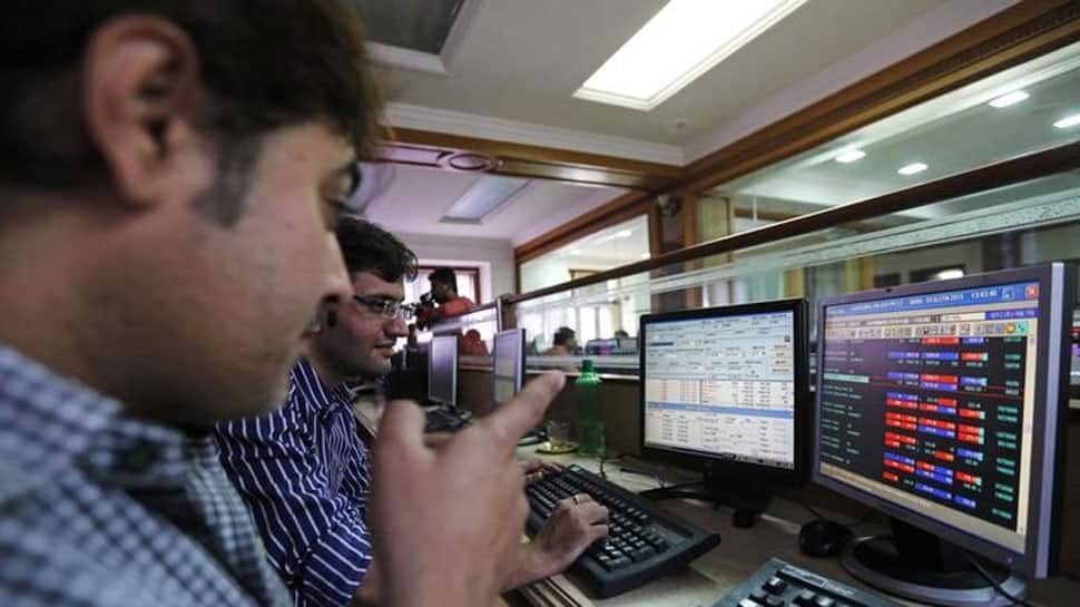 Markets open flat to negative, Nifty holds on to 11,000