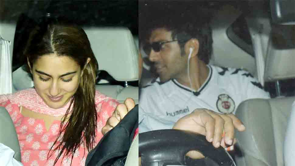 Sara Ali Khan blushes in pink as she receives Kartik Aaryan at airport — See pics