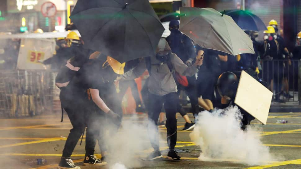 Hong Kong police arrest 29 after overnight clashes, more protests planned