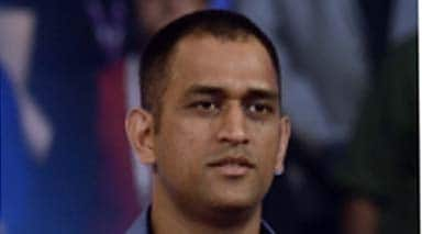 MS Dhoni spotted in brand new look at Jaipur airport--Watch