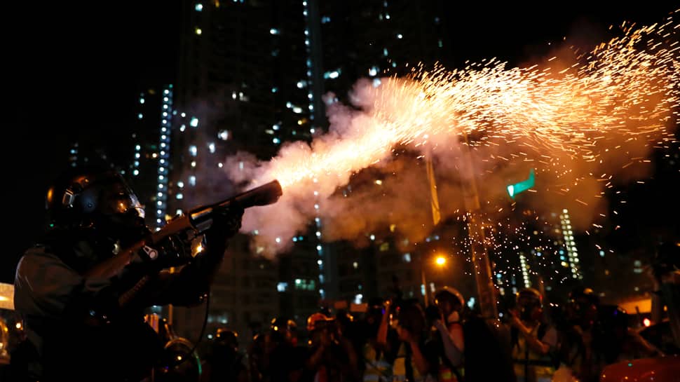 Hong Kong police fire gun, use water cannon on protesters