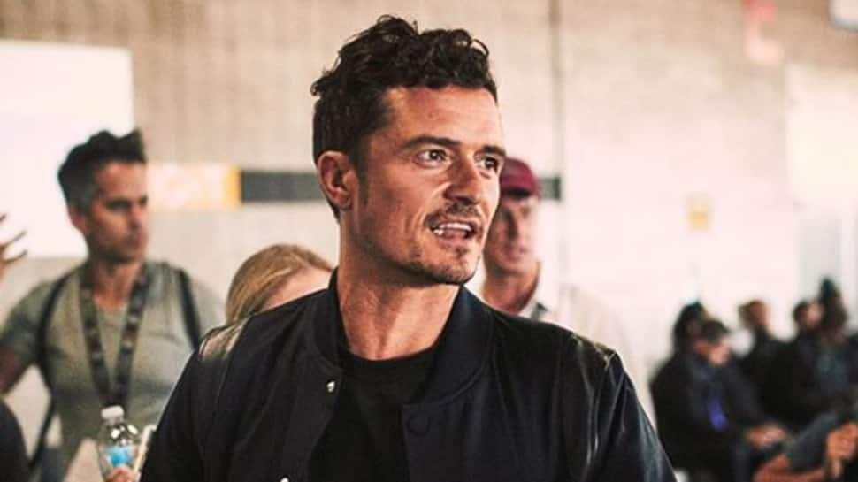 Orlando Bloom felt &#039;awkward&#039; filming steamy scenes with Cara Delevingne