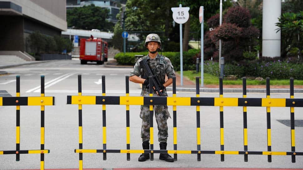 Chinese soldiers in Hong Kong won&#039;t &#039;sit on hands&#039; if situation worsens: China Daily