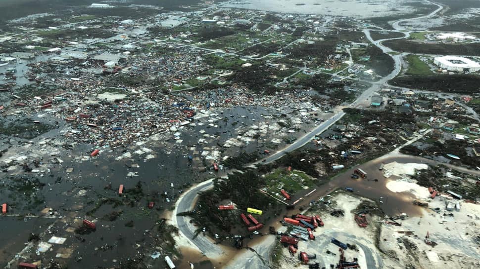 Bahamas staggers from Dorian&#039;&#039;s devastation, US coast fears storm surge