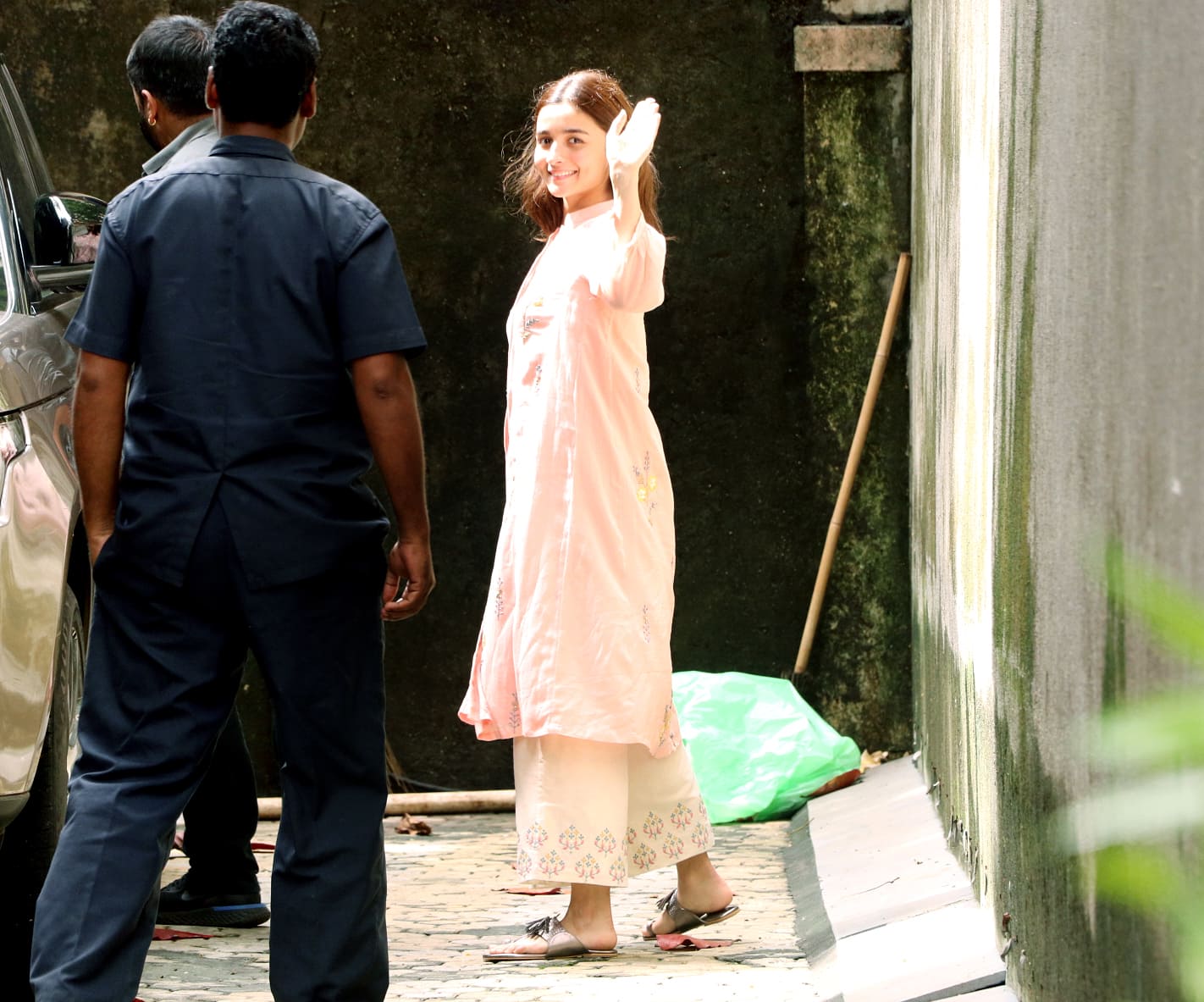 Alia Bhatt smiles at the paps