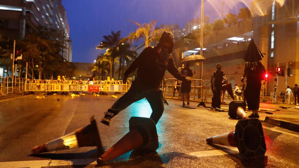 In plea to former colonial power, Hong Kong protesters sing ‘God save the queen’